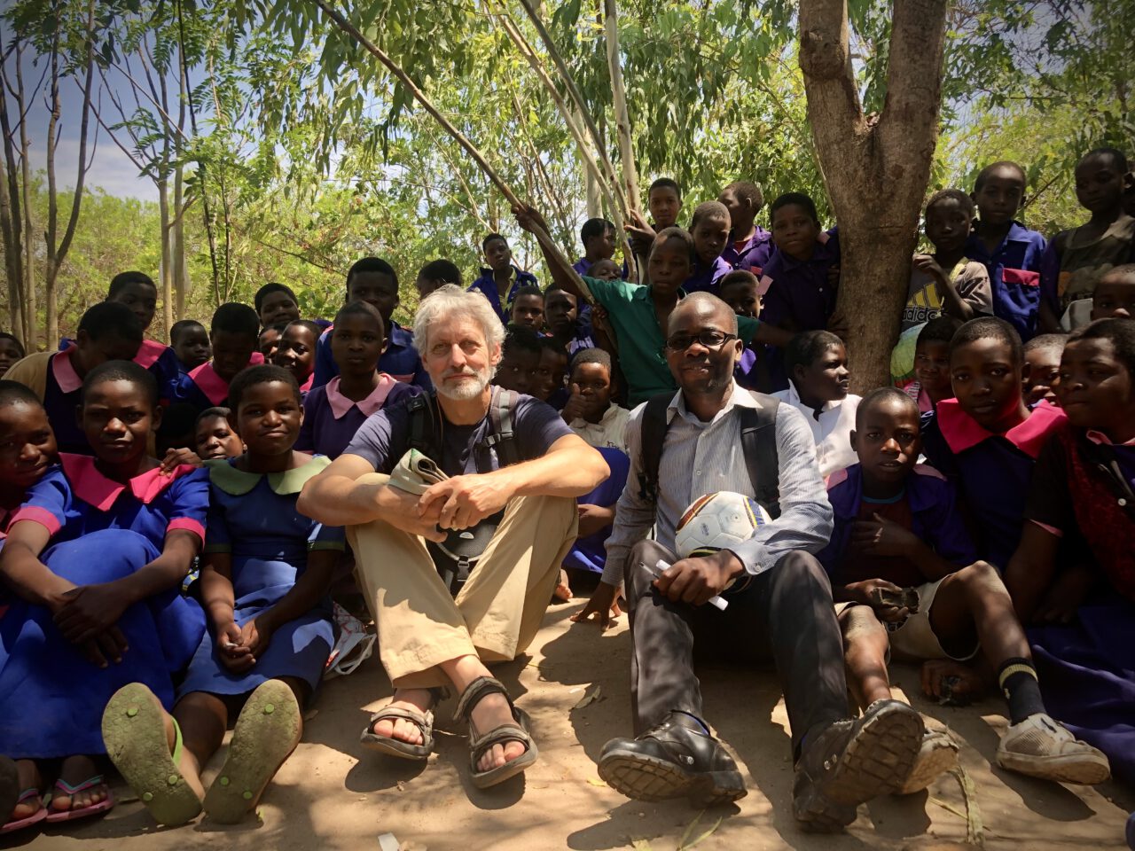 MOYO members with children during a visit to Mulanje